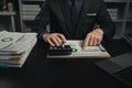 Businessman in the office in the middle of the night, he works overtime at a startup company, he is working hard and overtime. Royalty Free Stock Photo