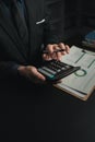 Businessman in the office in the middle of the night, he works overtime at a startup company, he is working hard and overtime. Royalty Free Stock Photo