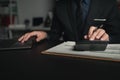 Businessman in the office in the middle of the night, he works overtime at a startup company, he is working hard and overtime. Royalty Free Stock Photo