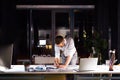 Businessman in the office at night working late. Royalty Free Stock Photo