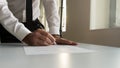 Businessman in office signing contract, document or legal papers Royalty Free Stock Photo