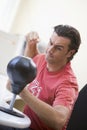 Businessman in office using small punching bag Royalty Free Stock Photo