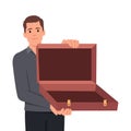 Businessman with open an empty suitcase Royalty Free Stock Photo