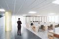 Businessman in open space modern office