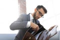 Detail of a businessman holding his briefcase Royalty Free Stock Photo