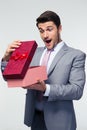 Businessman opening gift box Royalty Free Stock Photo