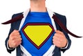 Businessman opening shirt in superhero style