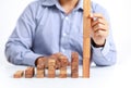 Businessman and outstanding wooden toy block