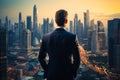 Businessman Overlooking Urban Cityscape.