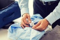 Businessman packing clothes into travel bag Royalty Free Stock Photo