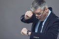 Businessman panicking after looking at the time Royalty Free Stock Photo