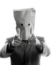 Businessman with paper bag in head Royalty Free Stock Photo