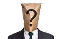 Businessman with a paper bag on the head with question mark