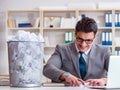 Businessman in paper recycling concept in office Royalty Free Stock Photo