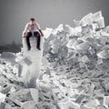 Businessman with paper sheet anywhere. Buried by bureaucracy concept. Royalty Free Stock Photo