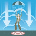 Businessman in parachute landing on the target