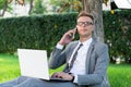 Businessman in the park Royalty Free Stock Photo