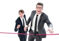 Businessman and partner crosses the finish line Royalty Free Stock Photo