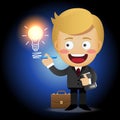 Businessman with pen drawing light bulb