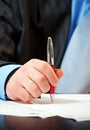 Businessman with pen signing contract Royalty Free Stock Photo