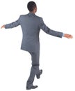 Businessman performing a balancing act