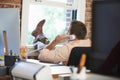 Businessman On Phone Relaxing In Modern Creative Office Royalty Free Stock Photo