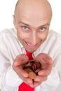 Businessman with pile of coins Royalty Free Stock Photo