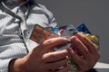 Businessman with a pill, hands close view - concept of difficulties, depression, problems, health and stress, risk of modern Royalty Free Stock Photo