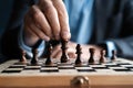 Businessman play with chess game. concept of business strategy and tactic. Royalty Free Stock Photo