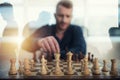 Businessman play with chess game. concept of business strategy and tactic. Double exposure Royalty Free Stock Photo