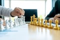 Businessman play chess on the marketing work place