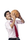 Businessman playing basket ball