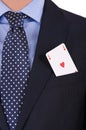 Businessman with playing card in his pocket. Royalty Free Stock Photo