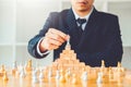 Businessman playing chess game Planning of leading strategy successful business leader concept Royalty Free Stock Photo