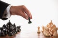 Businessman playing chess game selective focus Royalty Free Stock Photo