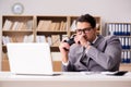 The businessman playing computer games at work office Royalty Free Stock Photo