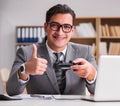 Businessman playing computer games at work office Royalty Free Stock Photo