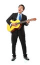 Businessman playing guitar Royalty Free Stock Photo