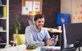 Businessman playing videogames in his office