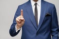 Businessman point finger at invisible screen, hand pushing touch screen, business man pressing digital virtual button Royalty Free Stock Photo