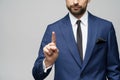 Businessman point finger at invisible screen, hand pushing touch screen, business man pressing digital virtual button Royalty Free Stock Photo