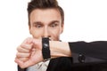 Businessman point at his watch isolated, time is money Royalty Free Stock Photo