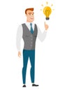 Businessman pointing at business idea light bulb. Royalty Free Stock Photo