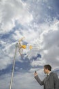 Businessman Pointing Cellphone At Aerial Royalty Free Stock Photo