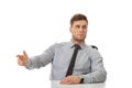 Businessman pointing by a desk in the office. Royalty Free Stock Photo