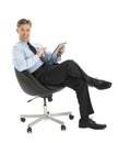 Businessman Pointing At Digital Tablet While Sitting On Office C Royalty Free Stock Photo