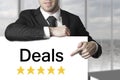 Businessman pointing on sign deals golden rating stars