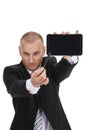 Businessman pointing with a sylus to a tablet phablet phone Royalty Free Stock Photo