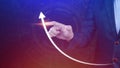 Businessman pointing touching growth on up arrow chart icon, hands touch the up arrow that represents profit rises, monetary