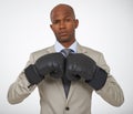 Businessman, portrait and boxing gloves for corporate competition for opportunity, rival or victory. Black man, face and